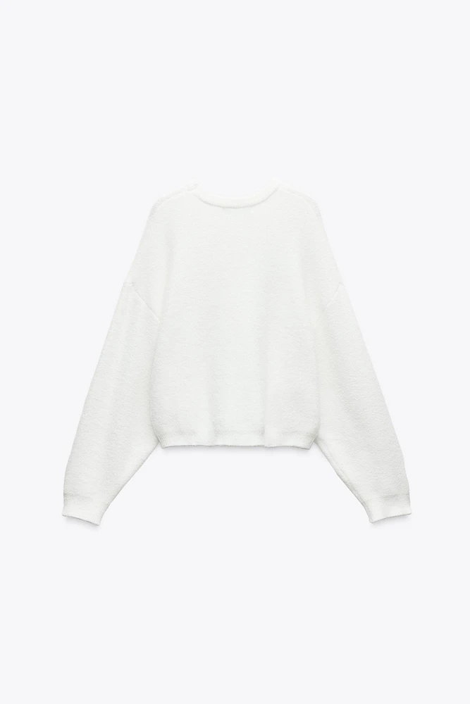 PULL EN MAILLE AU TOUCHER DOUX