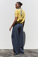GILET EN MAILLE BOUTON ÉTOILE