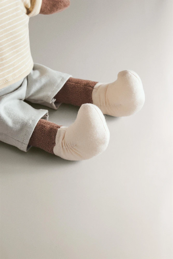 PELUCHE ENFANT SINGE MUSICAL