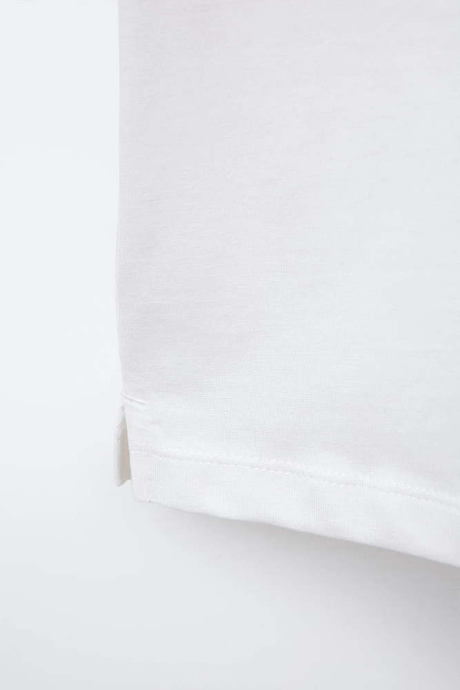T-SHIRT POCHE SANS MANCHES