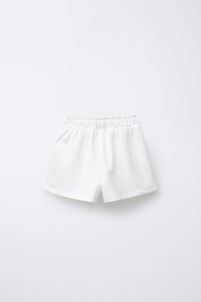 BERMUDA BANDES LATÉRALES CROCHET