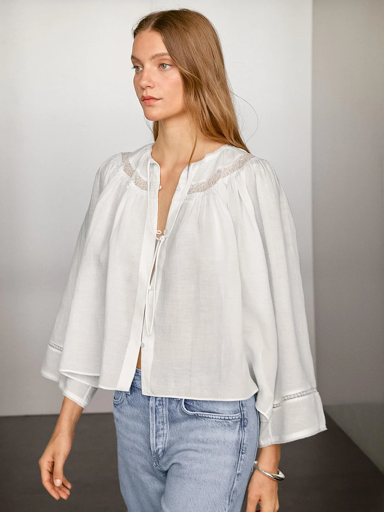 Flowing blouse with lace detail