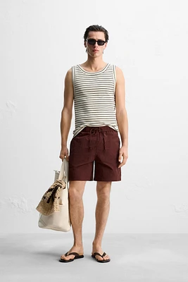 DRAWSTRING SWIM TRUNKS