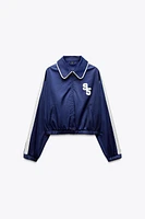 VESTE SATINÉE BANDE LATÉRALE