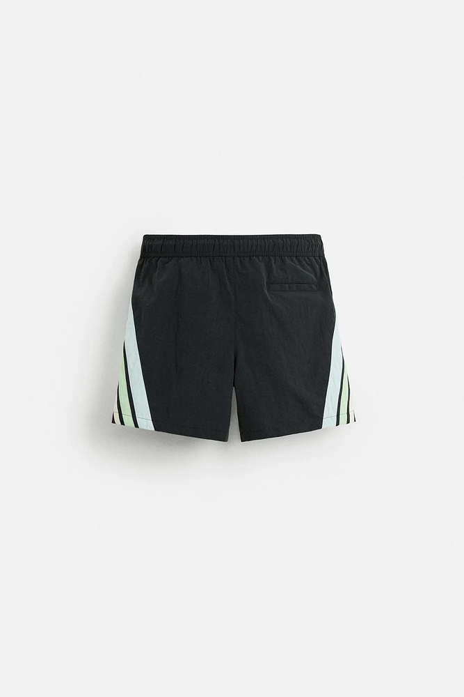 CONTRAST BANDS MID-LENGTH SWIMSUIT