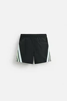 CONTRAST BANDS MID-LENGTH SWIMSUIT