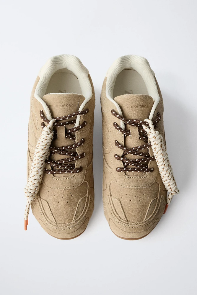 TENNIS EN CUIR À LACETS