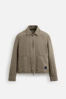 VESTE DÉLAVÉE CLOUS
