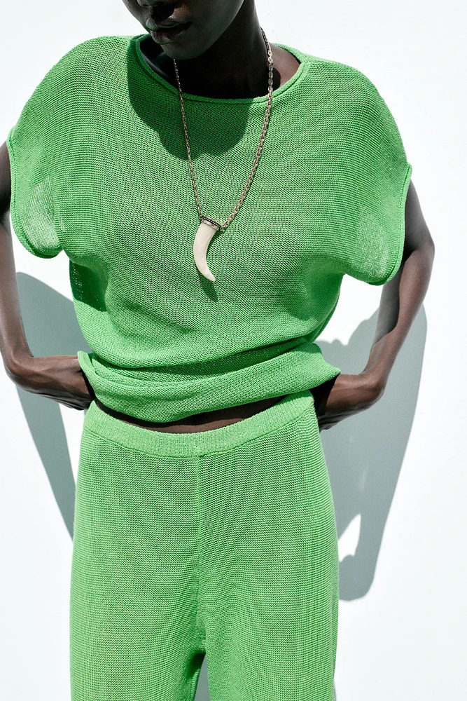 TOP EN MAILLE MANCHES LARGES