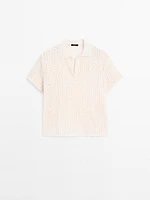 Polo en maille ajourée avec broderie