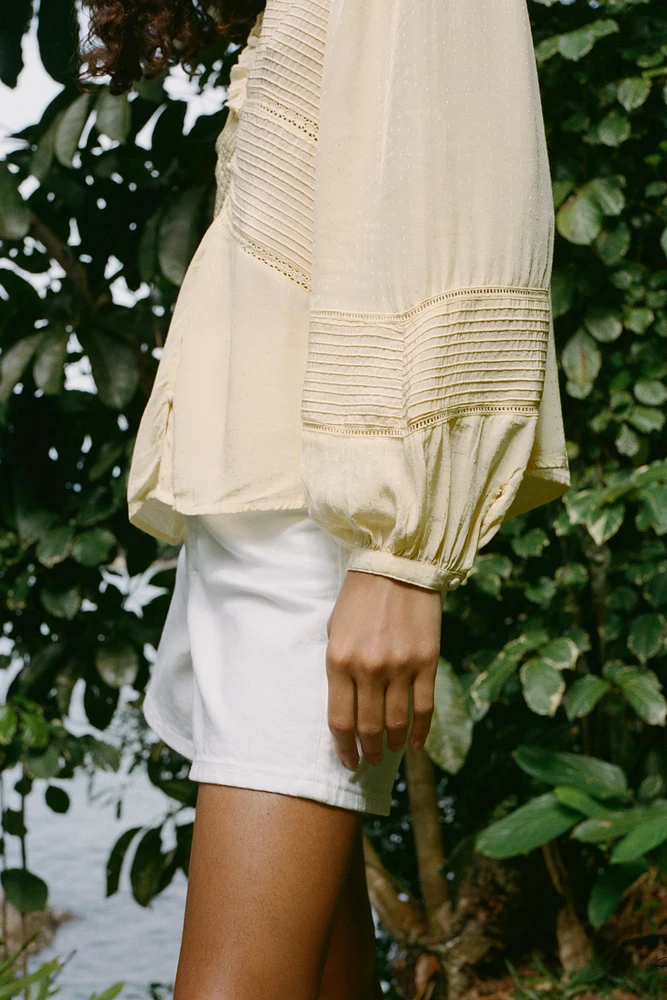 BLOUSE PLIS NERVURÉS ENTRE-DEUX