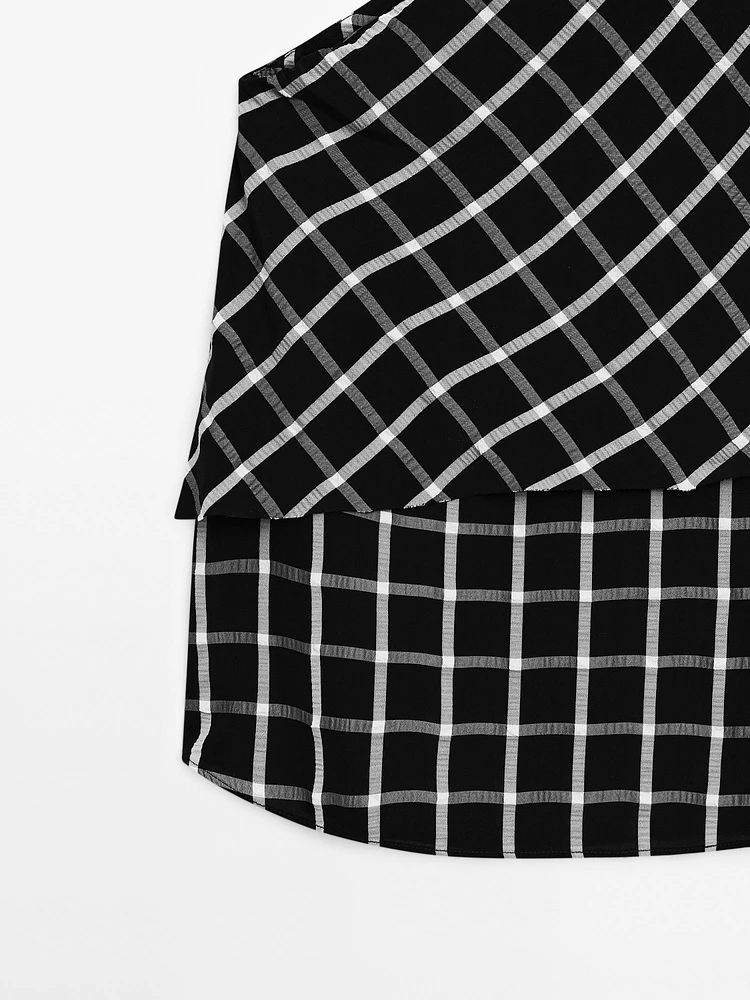 Checked top with asymmetric neckline
