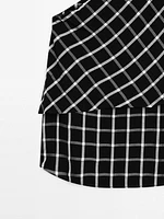 Checked top with asymmetric neckline