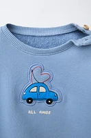 QUILTED CAR SWEATSHIRT