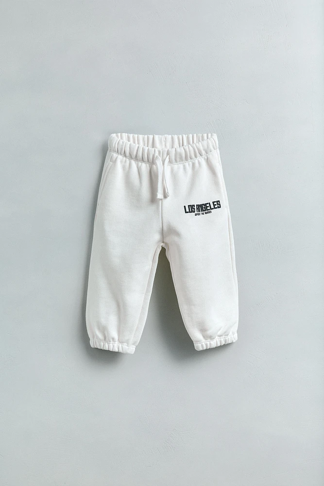 RAISED TEXT JOGGING PANTS