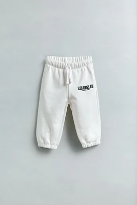 RAISED TEXT JOGGING PANTS