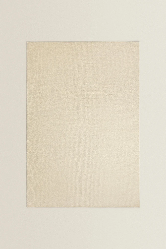 WAVY DETAIL WOOL AREA RUG