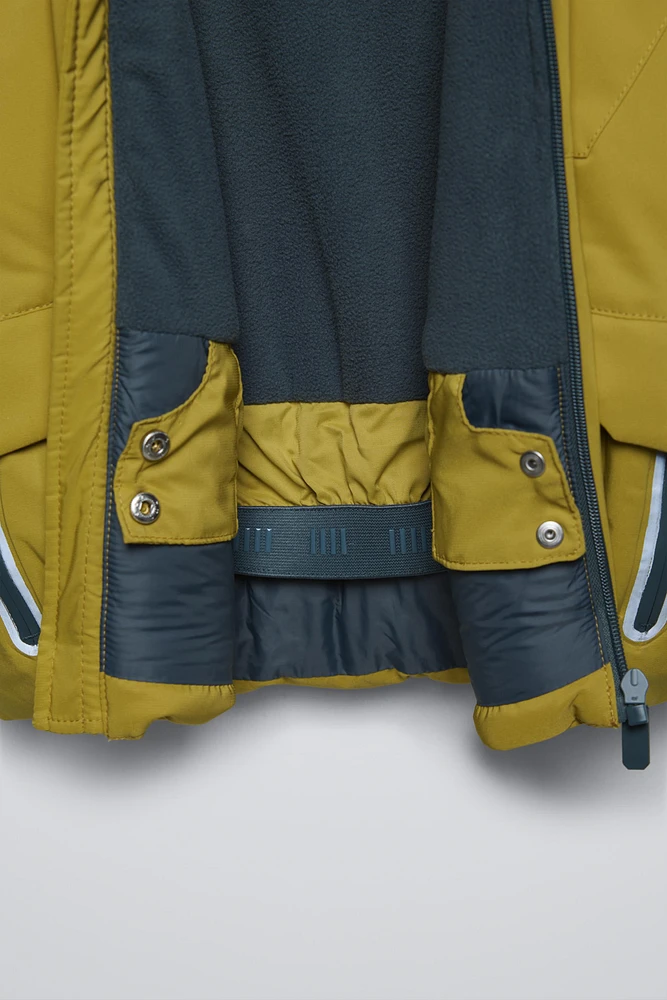 VESTE À CAPUCHE DÉPERLANTE ET COUPE-VENT COLLECTION SKI