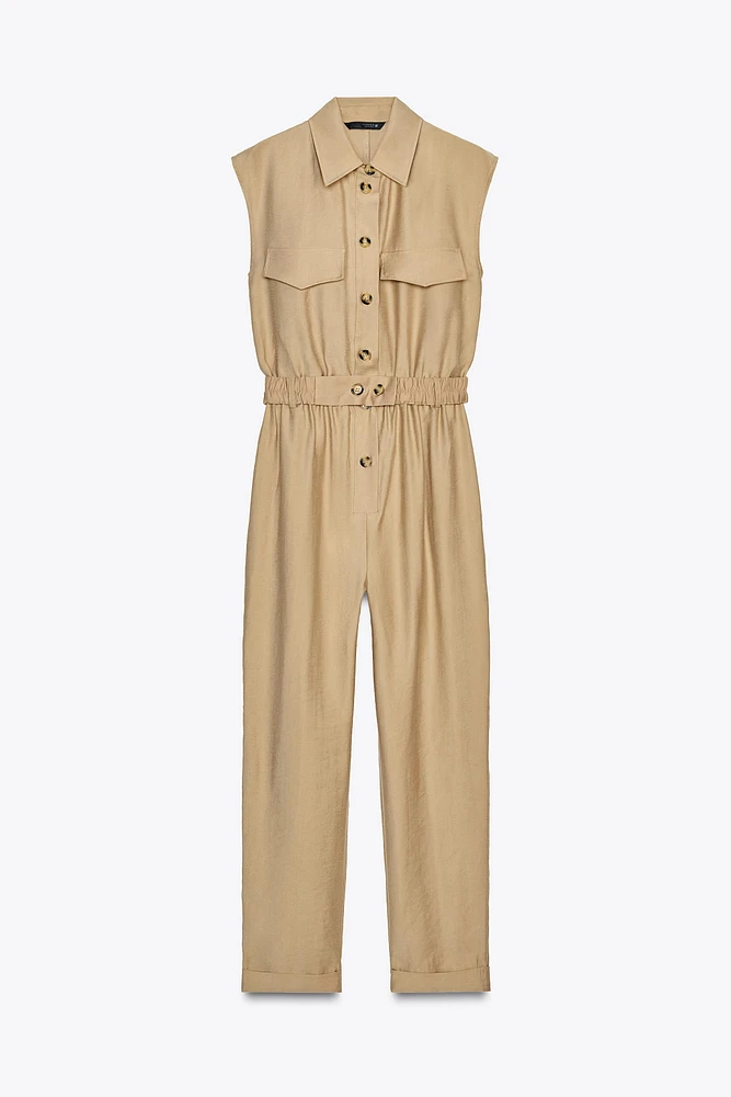 SLEEVELESS BELTED JUMPSUIT