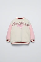 BOMBER JACKET WITH EMBROIDERED BOW