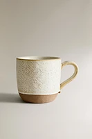 MUG WITH RAISED DESIGN