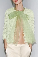 GILET EN MAILLE À FRANGES AVEC LACET ORGANZA