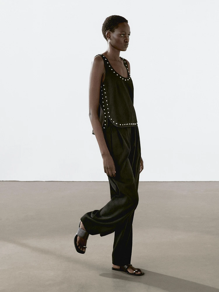 Suede leather top with stud details