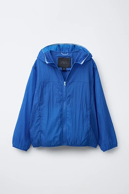 LIGHTWEIGHT PACKABLE WINDBREAKER