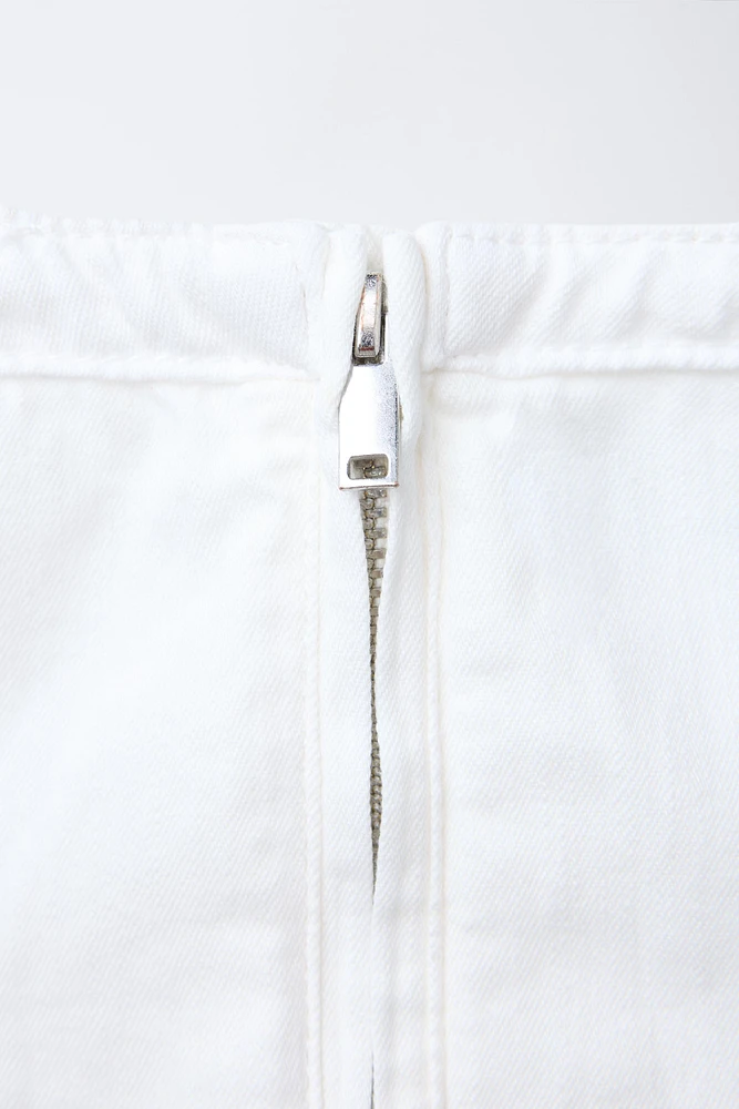 TOP SANS MANCHES ZIP
