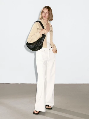 Short leather jacket with stud details