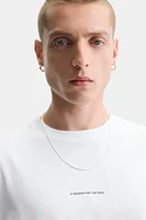 T-SHIRT IMPRIMÉ RELIEF