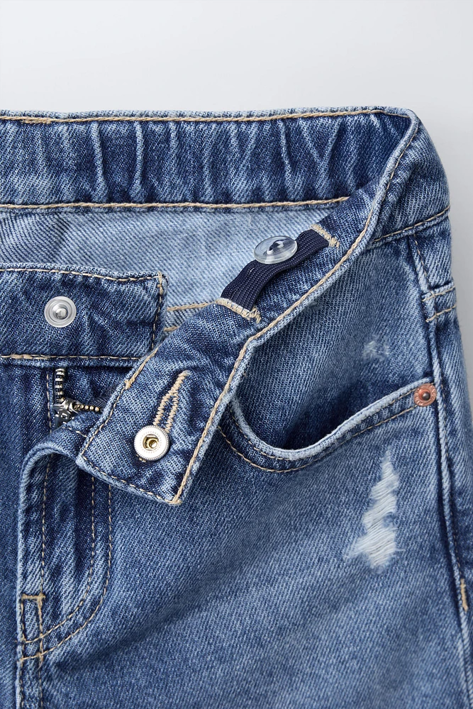 BERMUDA EN DENIM INSCRIPTION IMPRIMÉE
