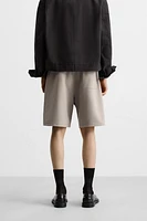 BERMUDA DE JOGGING OVERSIZE TECHNIQUE
