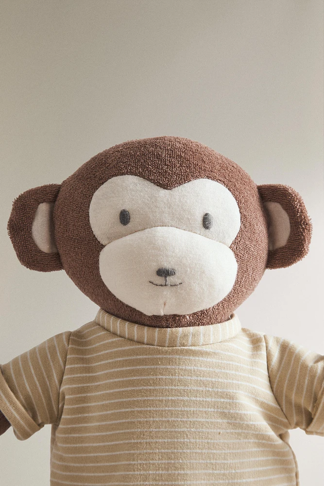 PELUCHE ENFANT SINGE MUSICAL