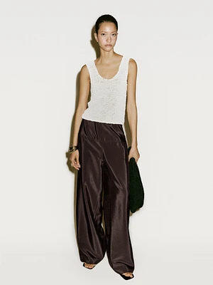Top tressé en cuir et daim