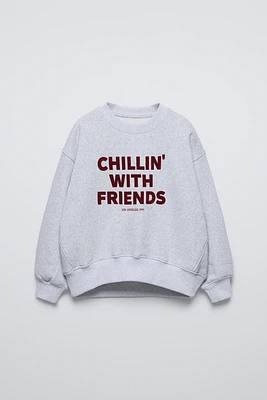 TEXT PRINT FLOCKED SWEATSHIRT