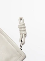 Petit sac pochette avec nœud en cuir nappa