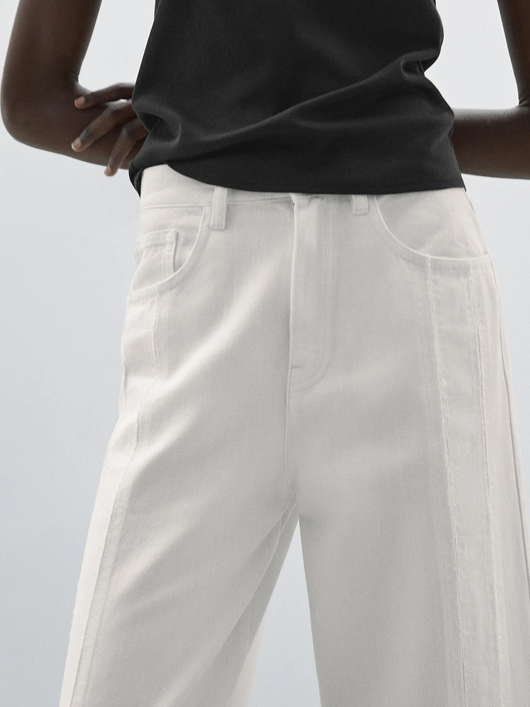 Jean wide leg taille haute avec découpes