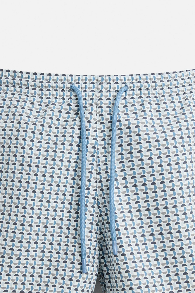 MAILLOT DE BAIN SEMI-LONG À IMPRIMÉ GÉOMÉTRIQUE