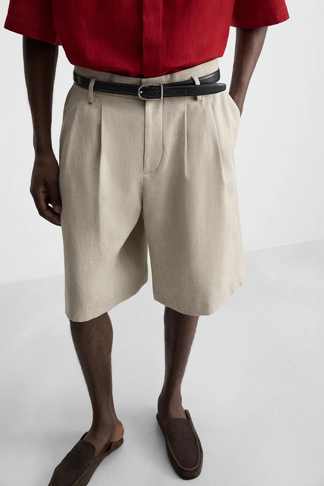 PLEATED WIDE FIT BERMUDA SHORTS