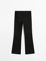 Pantalon flare stretch en cuir et daim