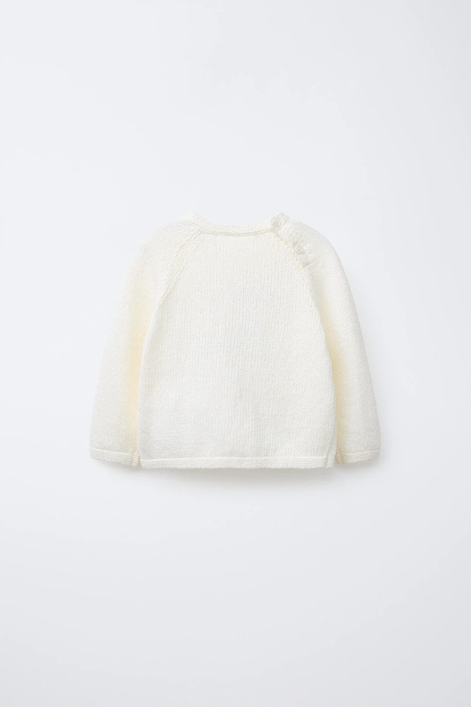 PULL EN MAILLE INSCRIPTION BRODÉE