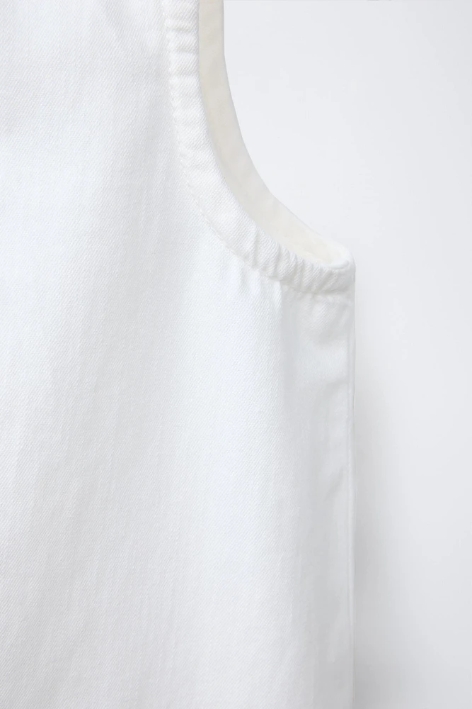 TOP SANS MANCHES ZIP
