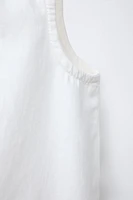 TOP SANS MANCHES ZIP