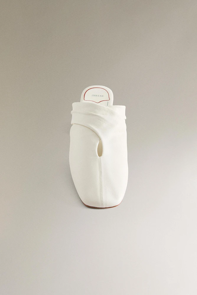 MULES CROISÉES CUIR