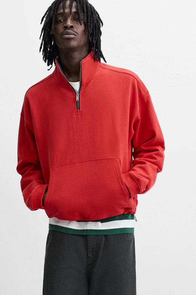 SWEAT À COL ZIPPÉ