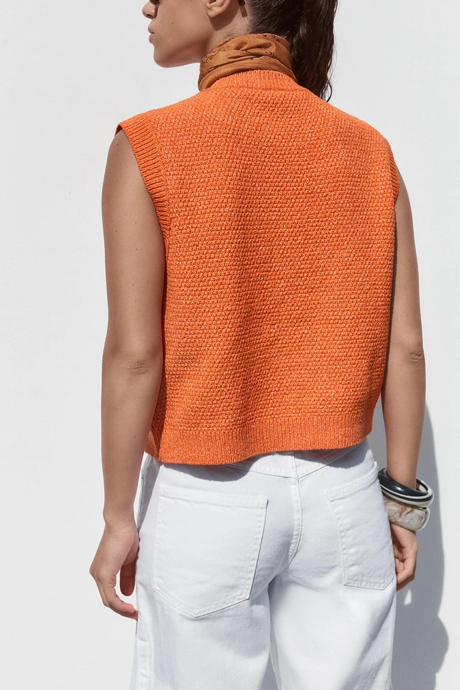 TOP GILET EN MAILLE BOUTON COQUILLAGE