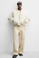 LIMITED EDITION RELAXED FIT PLEATED PANTS