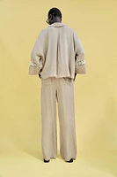 PANTALON LARGE BANDES LATÉRALES BRODÉES