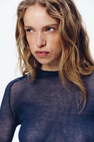 TOP EN MAILLE SEMI-TRANSPARENT